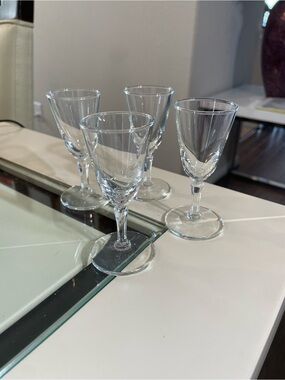 Vintage Libby cordial glasses featuring a characteristic tapered hexagonal stem